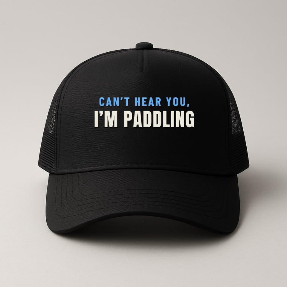 Can’t Hear You, I’m Paddling trucker hat, Black