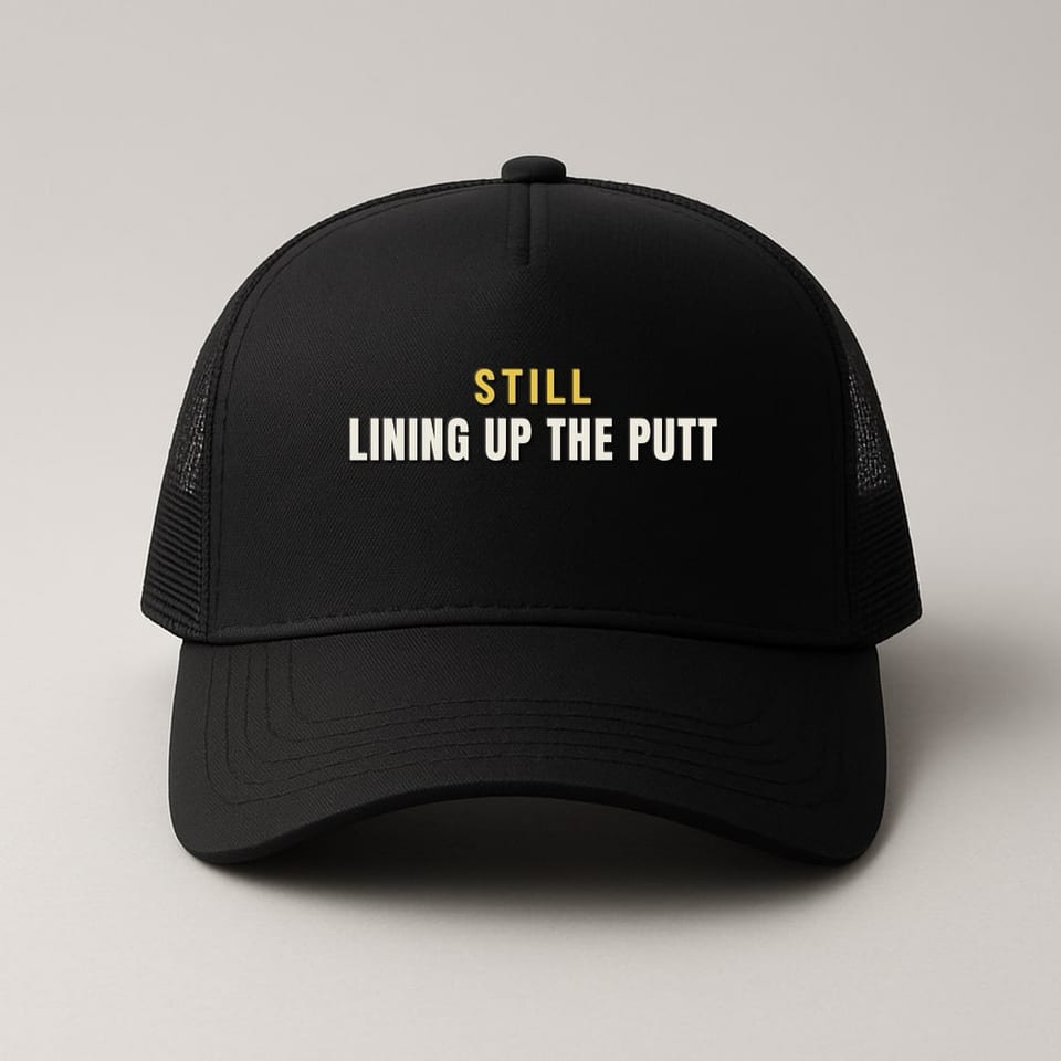 Still Lining Up the Putt trucker hat, Black
